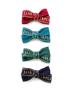 Logo ribbon hair corsage